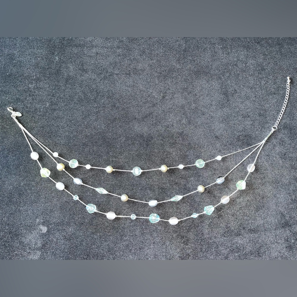 Elegant Lia Sophia triple stranded necklace. Purple/silver/light green.